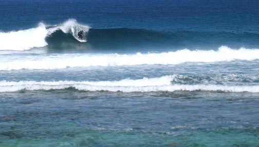 Surfing on Rum Cay, Bahamas